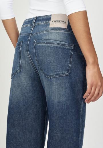 Клешеные джинсы