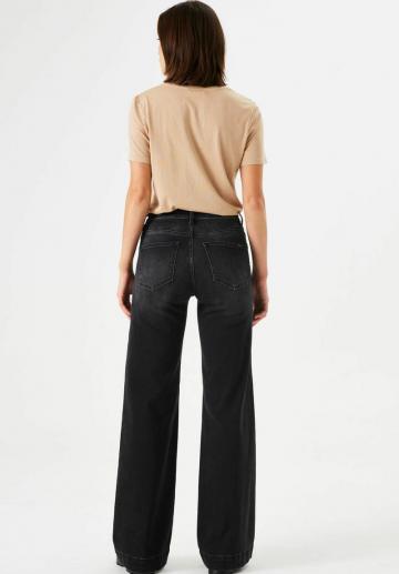 Клешеные джинсы