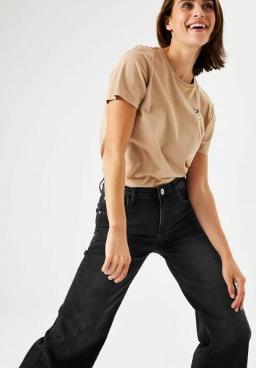 Клешеные джинсы