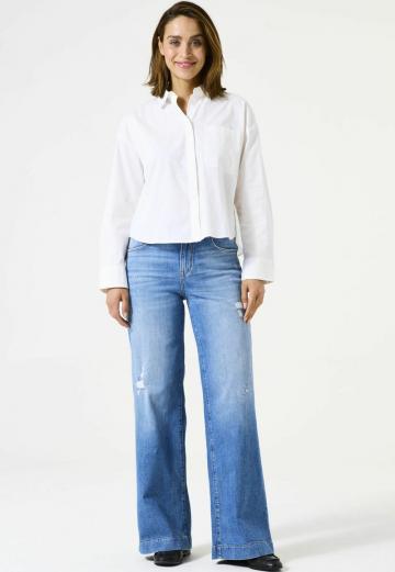 Клешеные джинсы