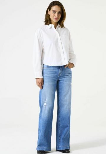 Клешеные джинсы