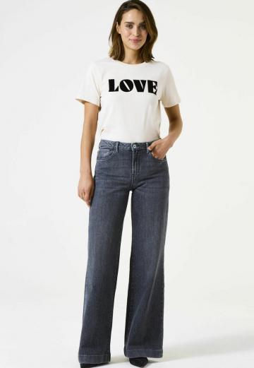 Клешеные джинсы