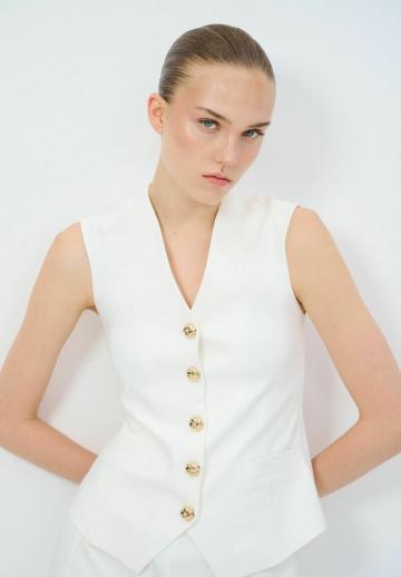 Джинсовая жилетка