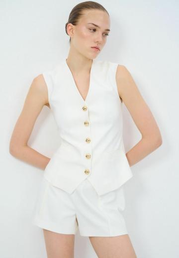 Джинсовая жилетка