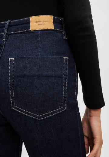 Клешеные джинсы