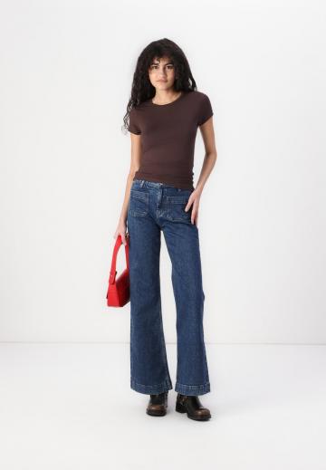 Клешеные джинсы