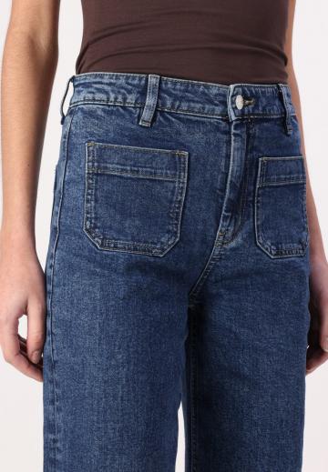 Клешеные джинсы