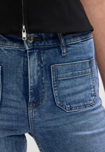 Клешеные джинсы