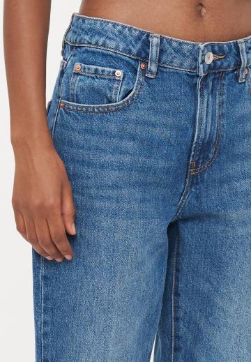 Клешеные джинсы