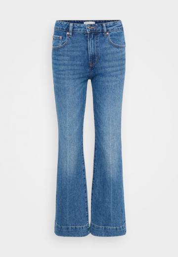 Клешеные джинсы