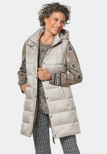 Длинный жилет