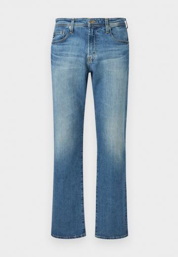 Клешеные джинсы