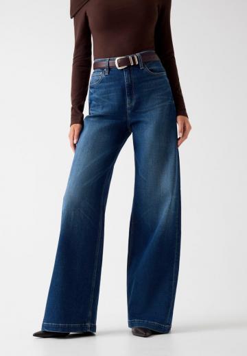 Клешеные джинсы