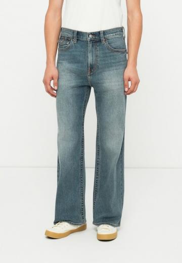 Клешеные джинсы