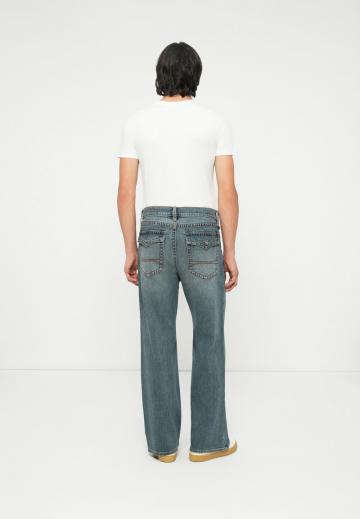 Клешеные джинсы