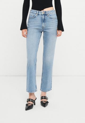 Клешеные джинсы