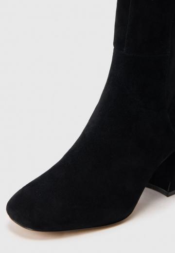 Высокие сапоги