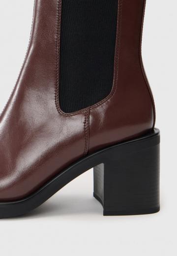 Высокие сапоги