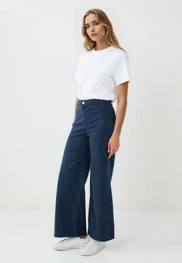 Клешеные джинсы