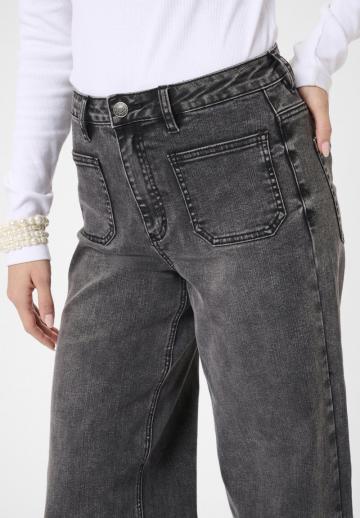 Клешеные джинсы