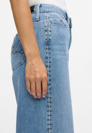 Клешеные джинсы