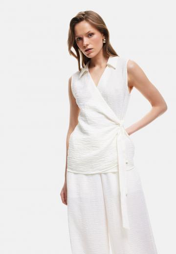 Блузка без рукавов