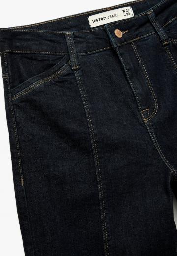 Клешеные джинсы