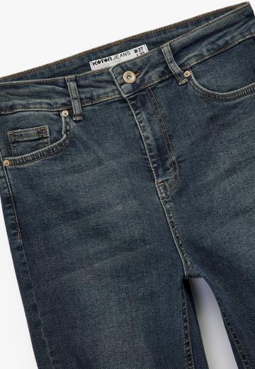 Клешеные джинсы