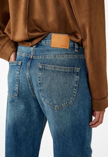 Клешеные джинсы