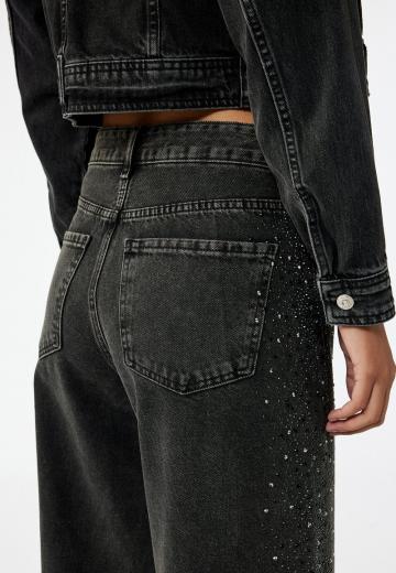 Клешеные джинсы