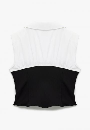 Блузка без рукавов