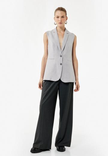 Длинный жилет