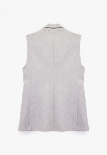 Длинный жилет