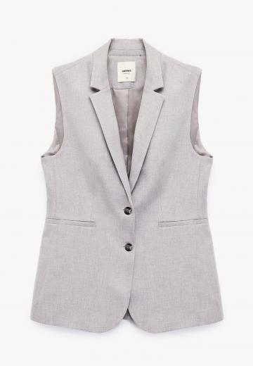 Длинный жилет