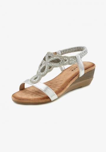 Босоножки на танкетке