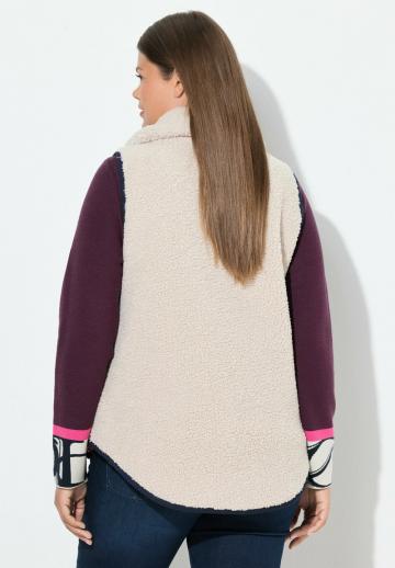 Длинный жилет