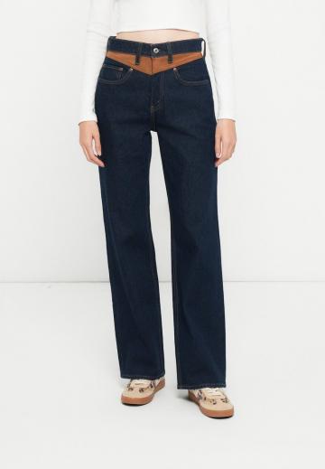 Клешеные джинсы