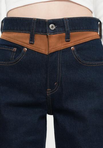 Клешеные джинсы