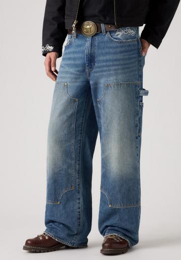 Клешеные джинсы