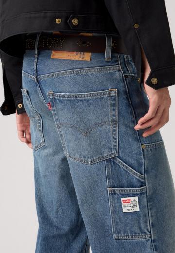 Клешеные джинсы