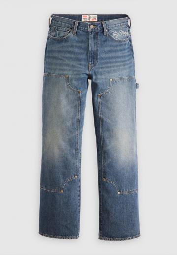 Клешеные джинсы