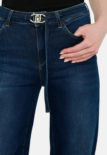 Клешеные джинсы