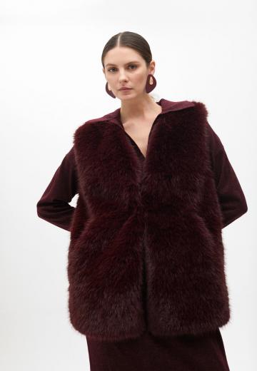 Длинный жилет