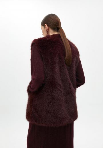 Длинный жилет