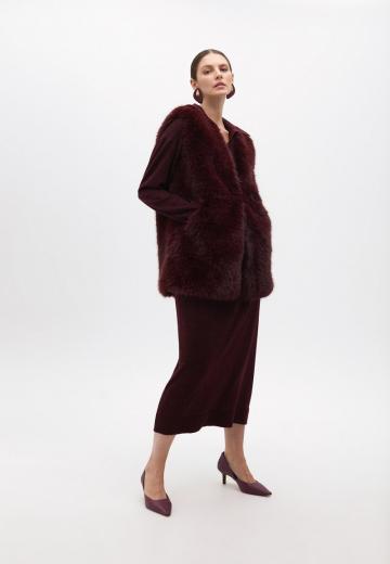 Длинный жилет