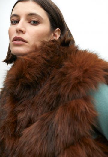 Пуховой жилет