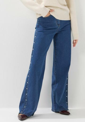 Клешеные джинсы