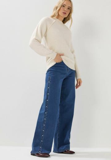 Клешеные джинсы