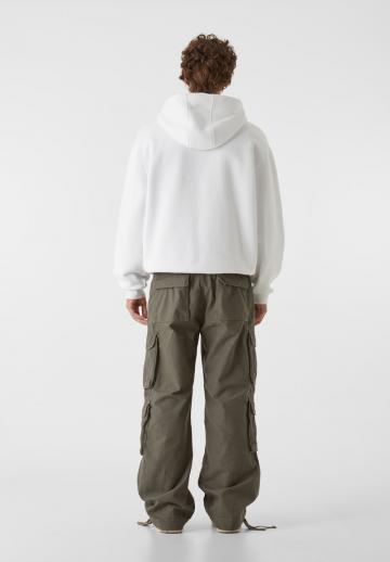 Брюки с накладными карманами