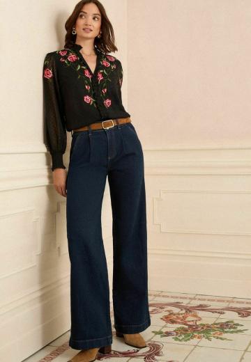 Клешеные джинсы